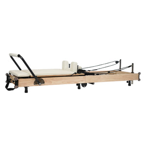 Premium wood and steel construction — Ava Reform home Pilates reformer close up