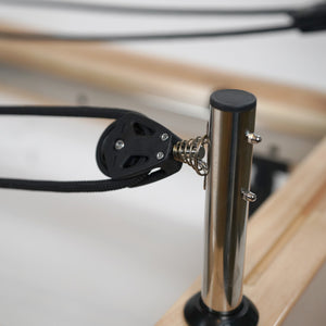 Ava Reform reformer carriage detail — smooth glide system for home Pilates workouts