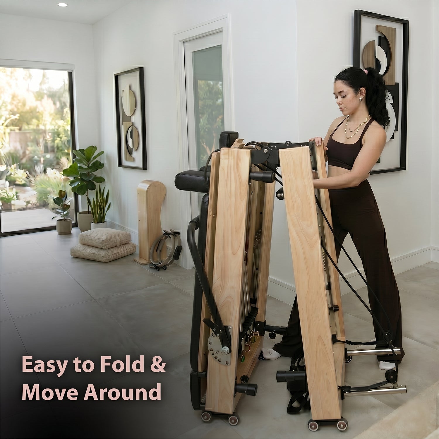 Foldable home Pilates reformer stored against wall — compact design by Ava Reform